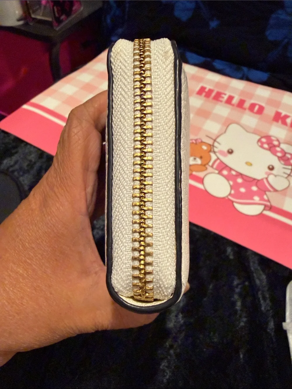 kate spade White Pebbled Leather Zip Wallet with Black Bow and Gold Bar